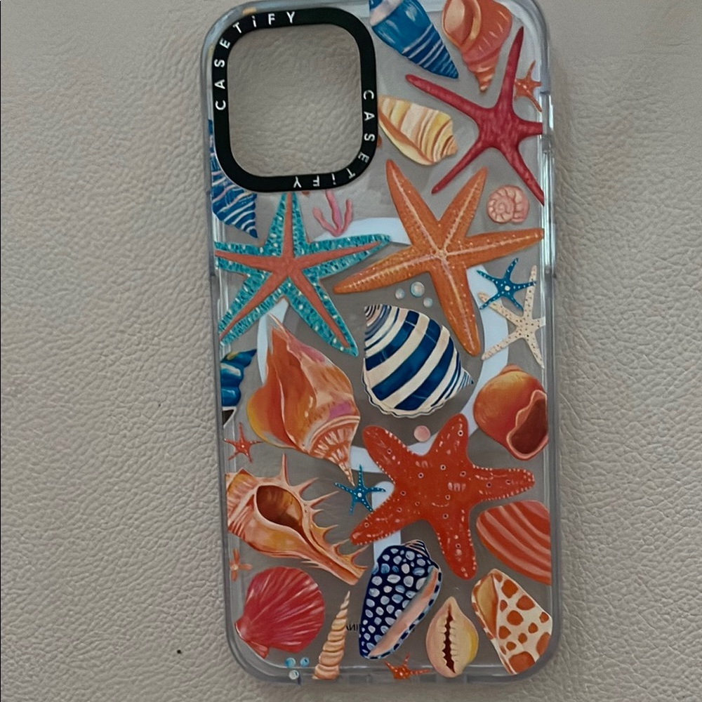 Casetify Orange and Blue Seashell iPhone Case